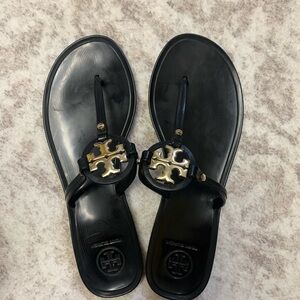 Tory Burch Black Sandals with Gold Emblem